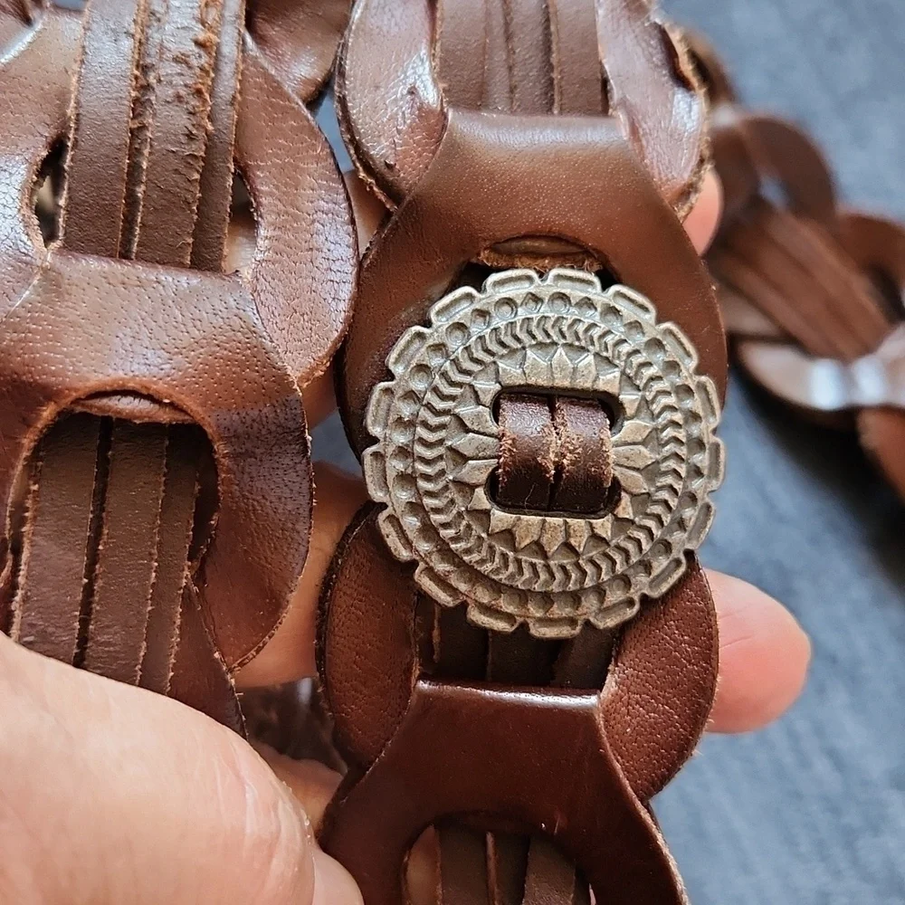 Braided genuin brown braided leather belt with silver tone details sz M